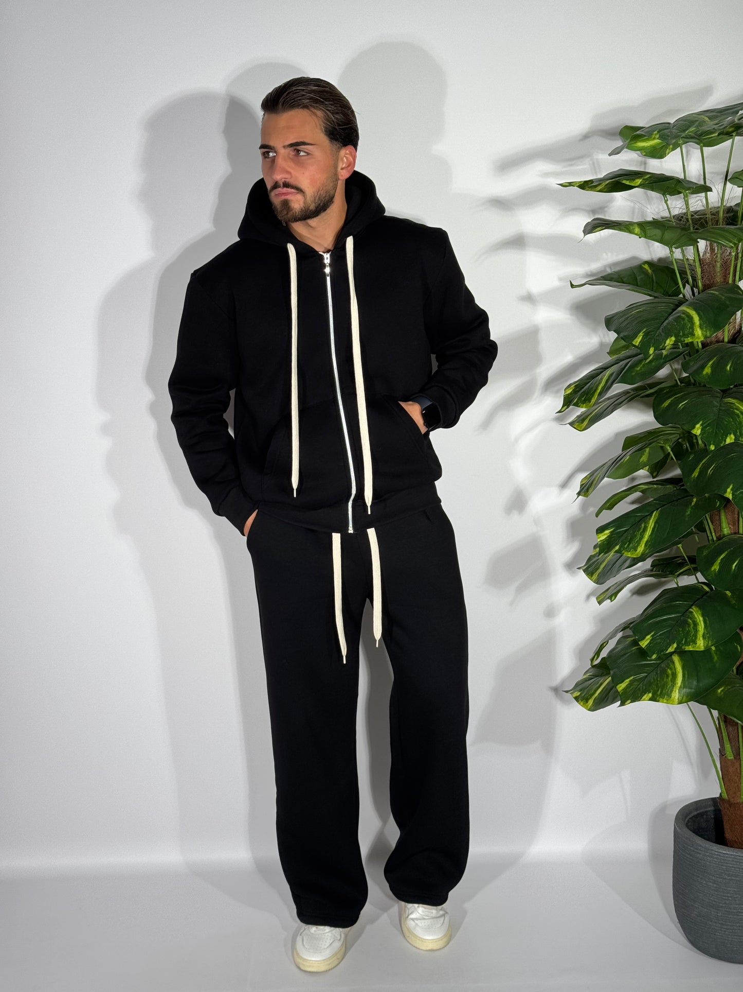 Tuta fondo ampio con zip