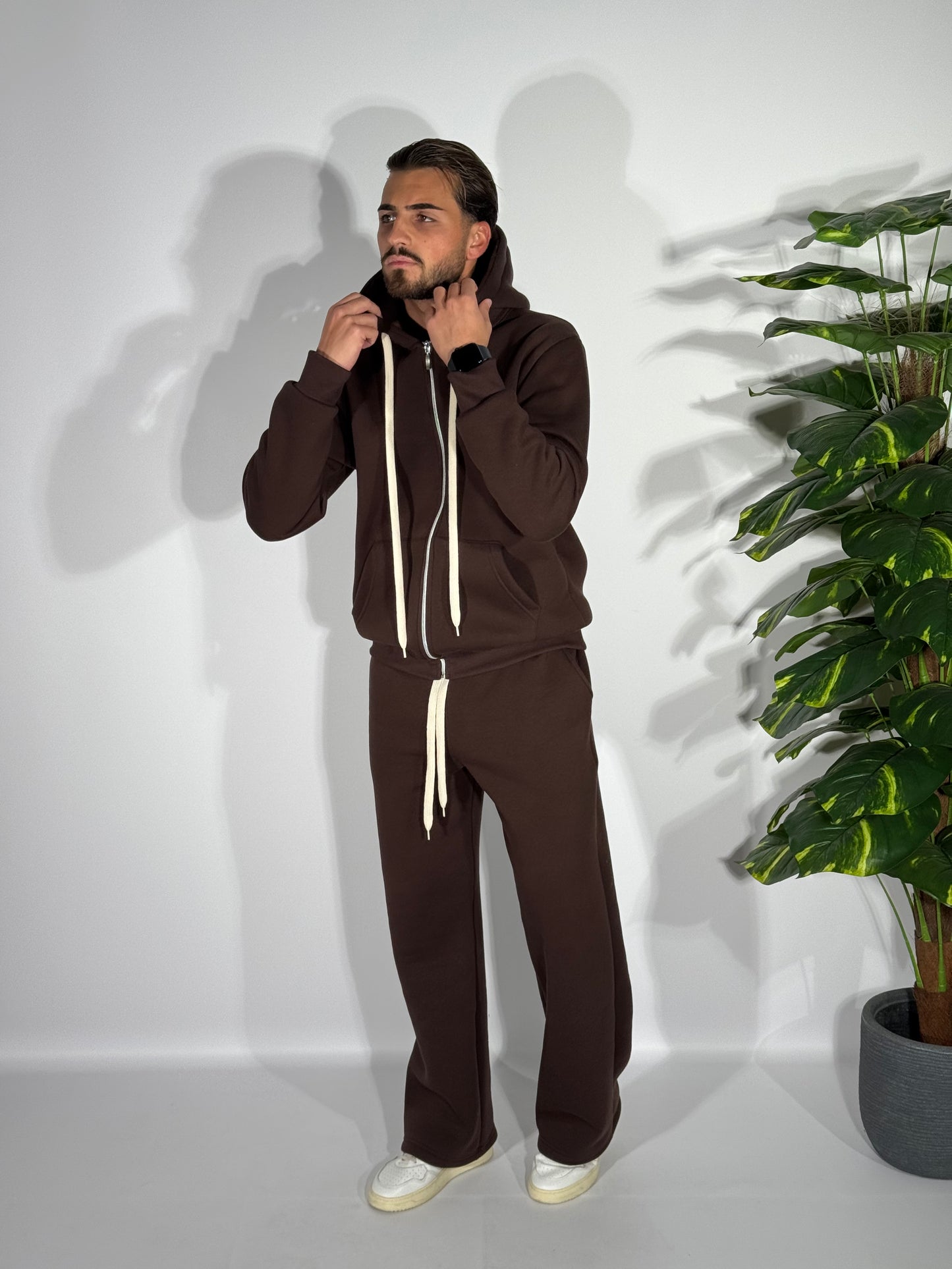 Tuta fondo ampio con zip