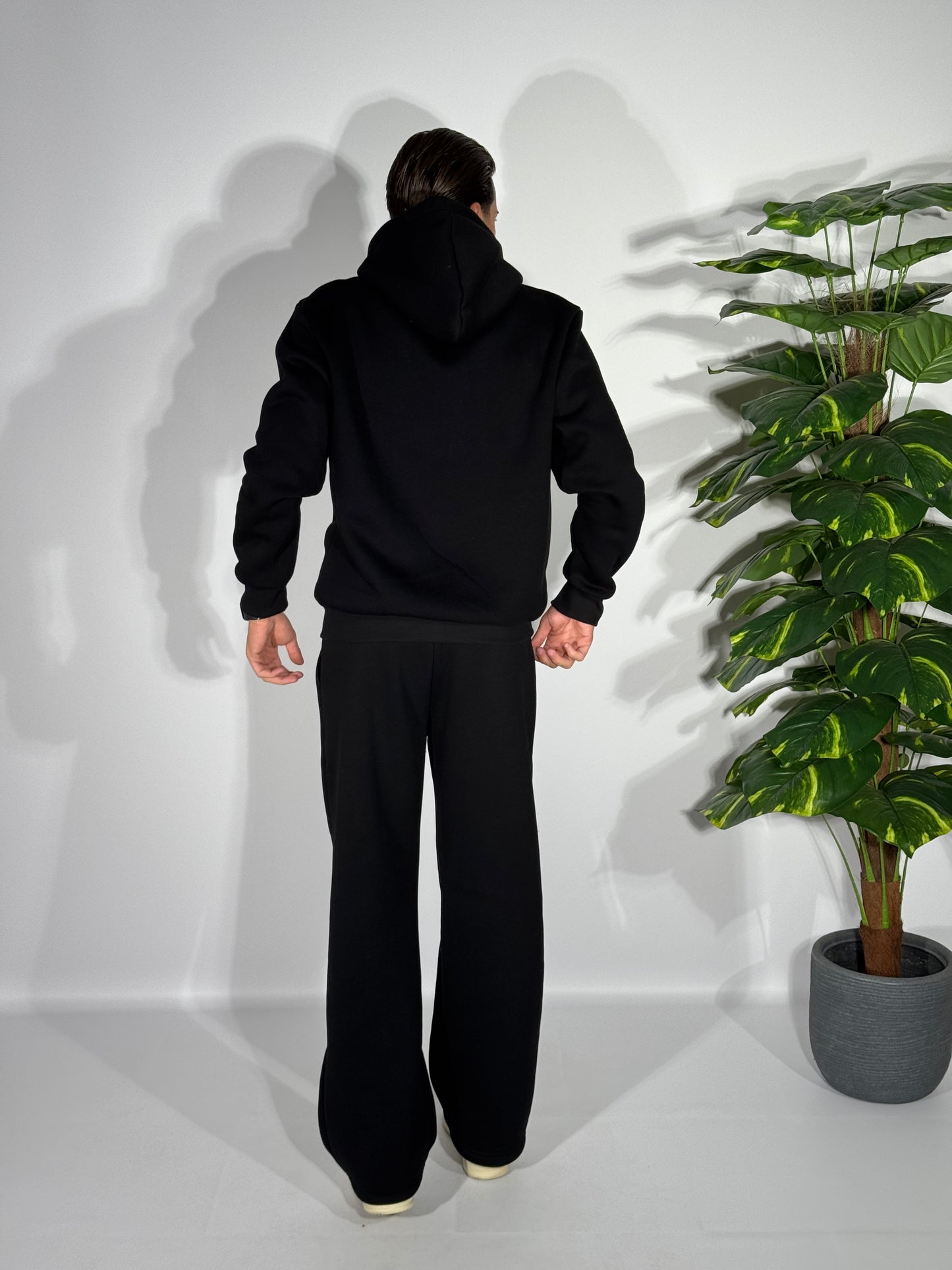 Tuta fondo ampio con zip