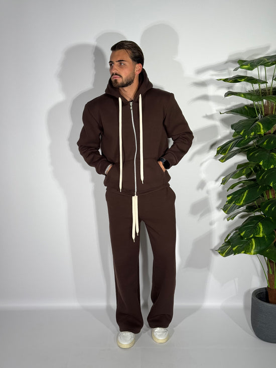 Tuta fondo ampio con zip