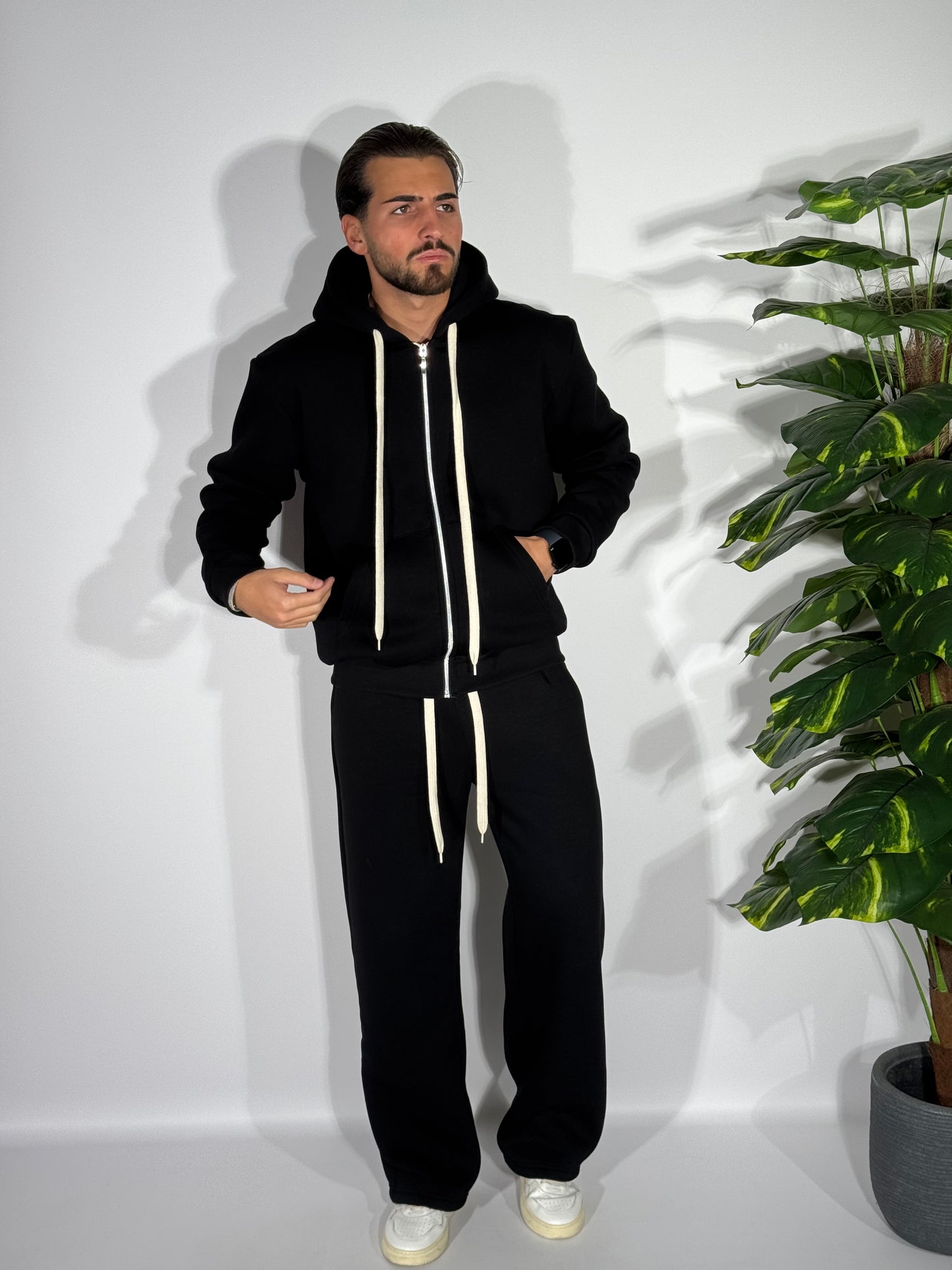 Tuta fondo ampio con zip