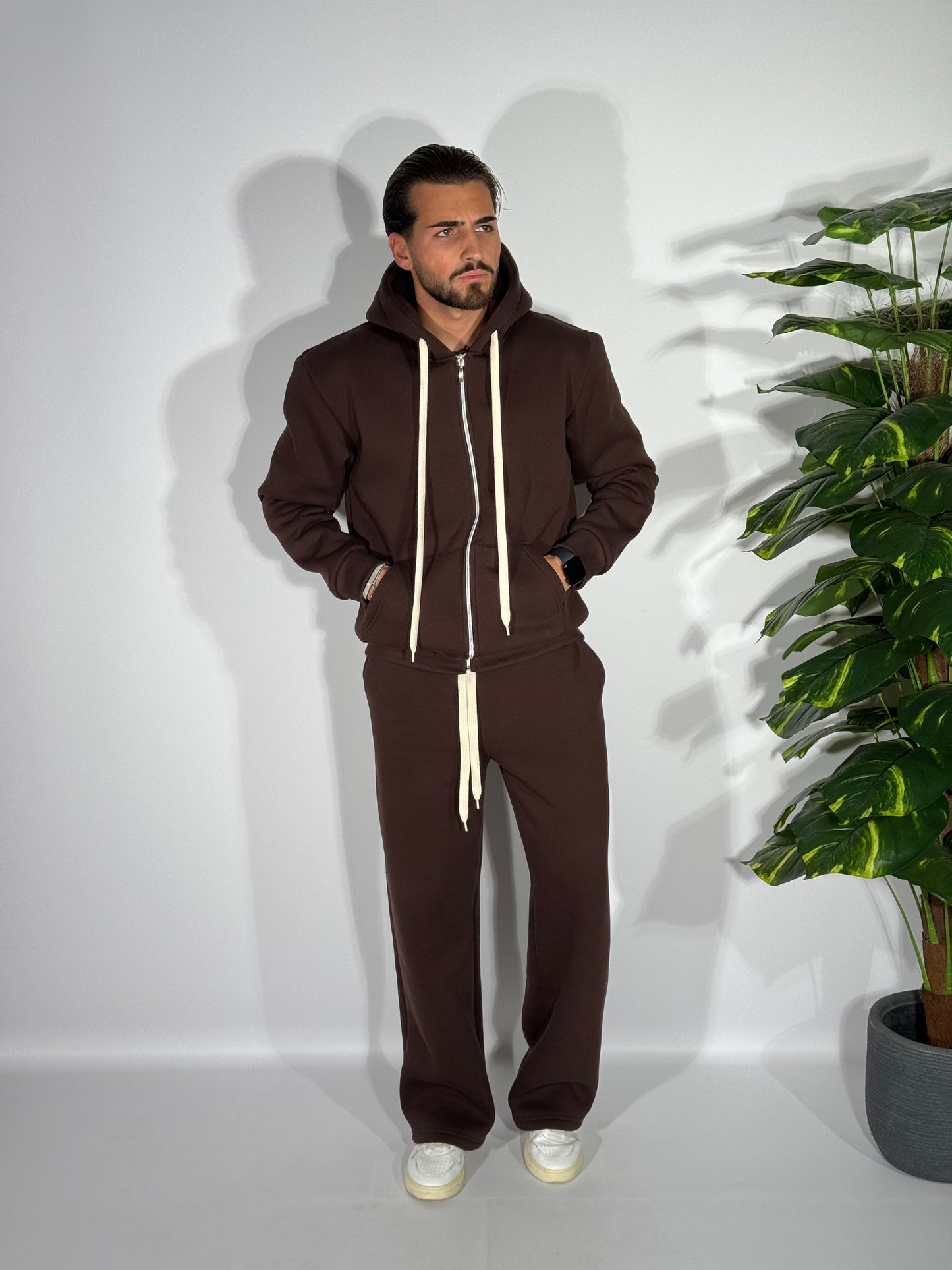 Tuta fondo ampio con zip