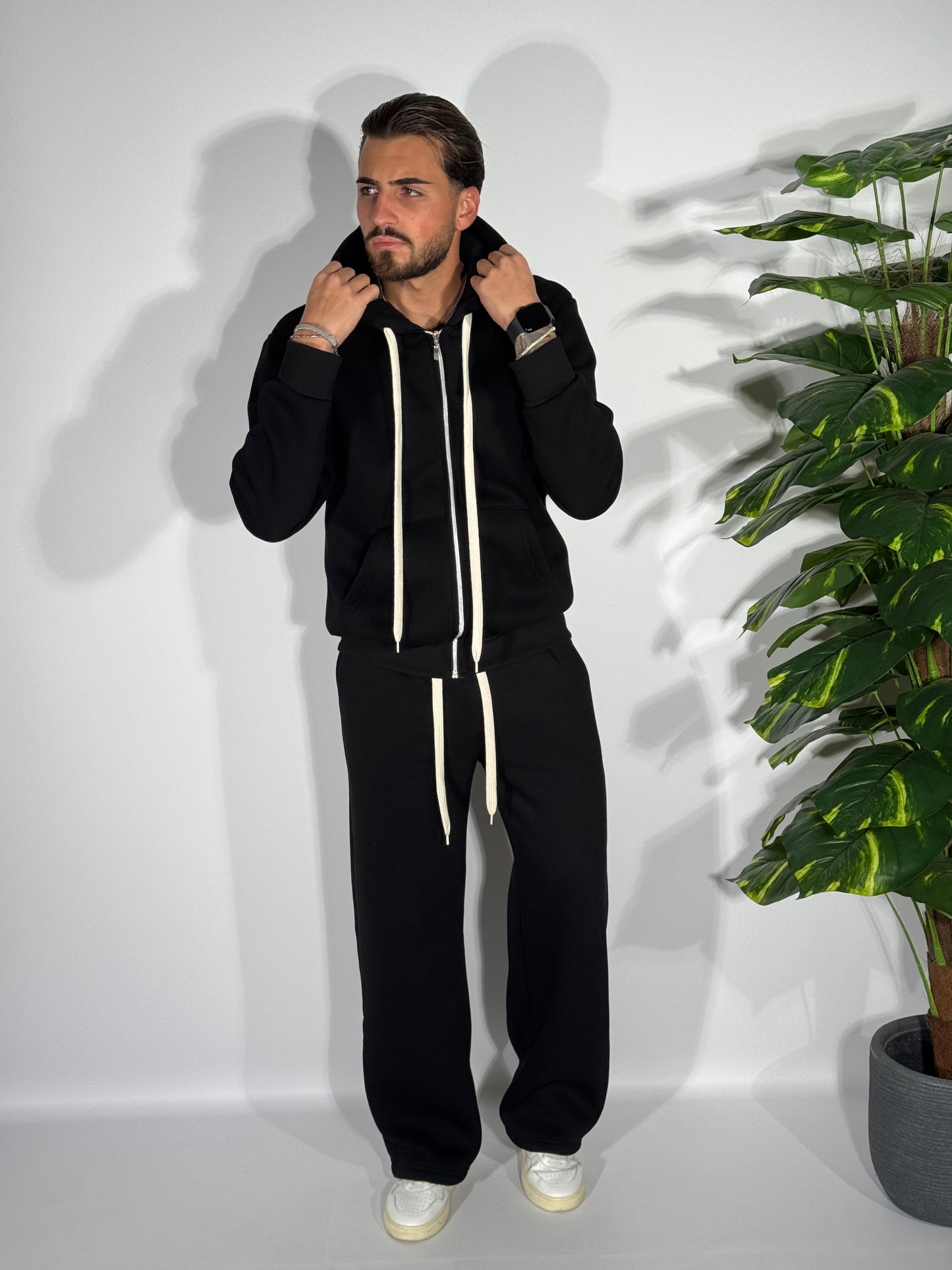 Tuta fondo ampio con zip